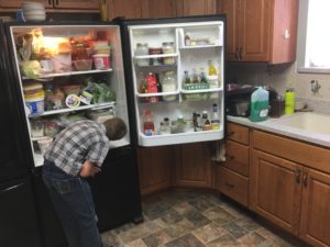 were building patience cleaning the refrigerator.